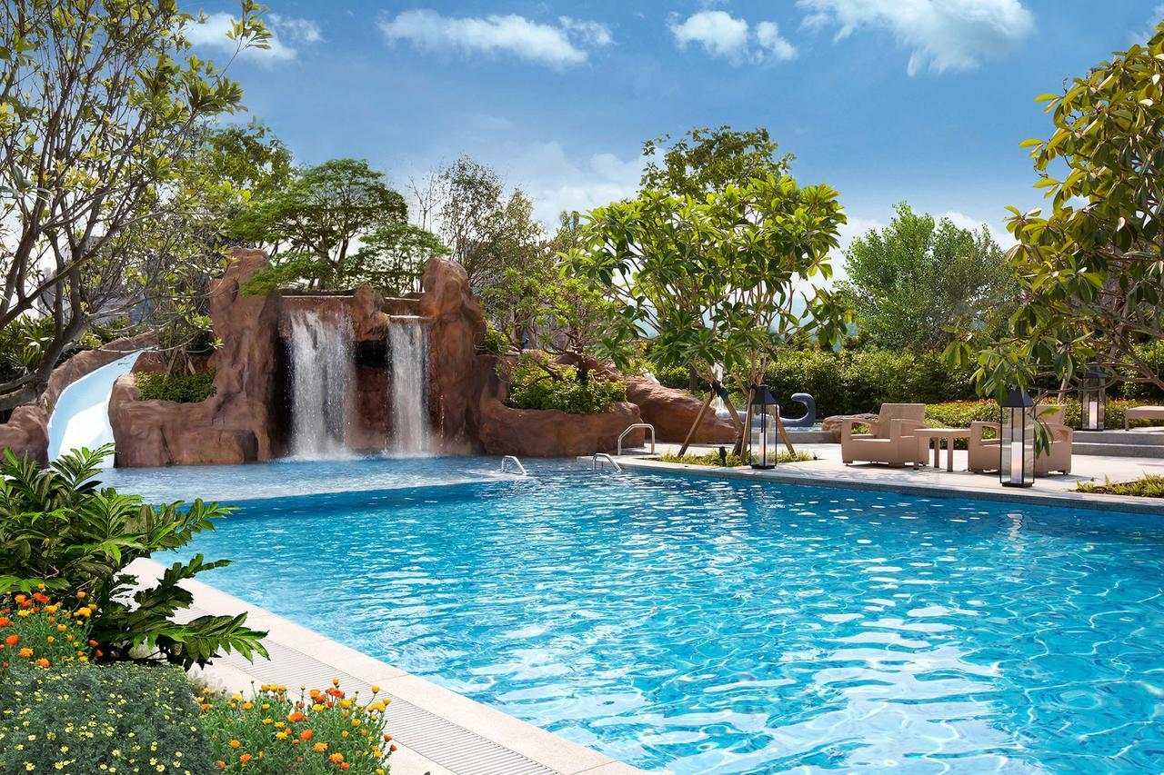Mu Jiaoxi Hotel Buitenkant foto The swimming pool at the resort